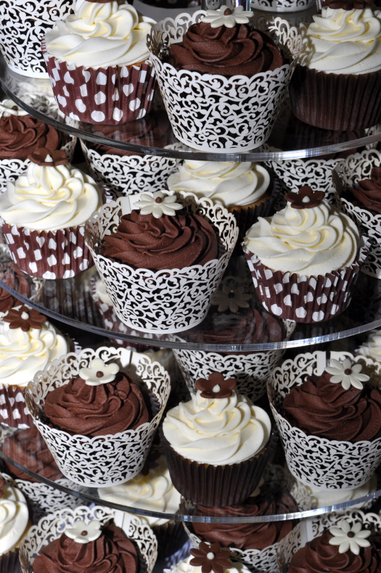 Some of the brown cases were inserted into Ivory Lace cupcake wrappers from 