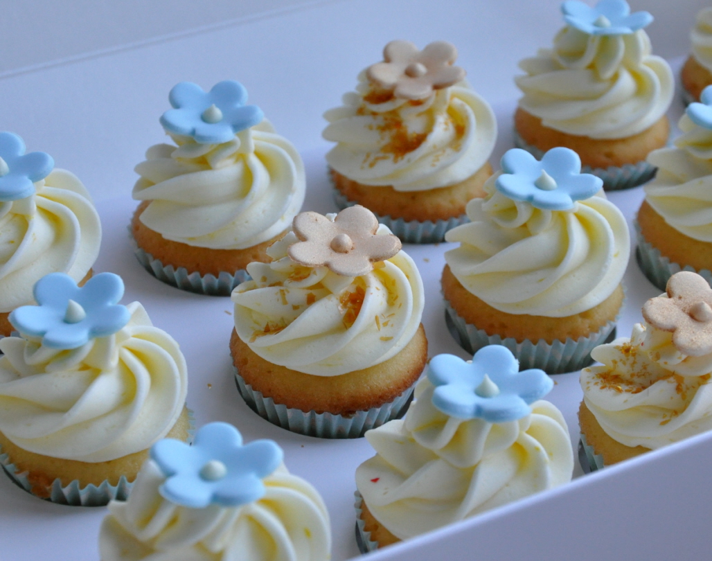 white and gold baby shower cupcakes